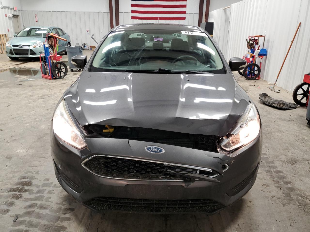 2017 Ford Focus VIN 1FADP3F27HL286582 Copart auction photo, front end damage thumbnail 5