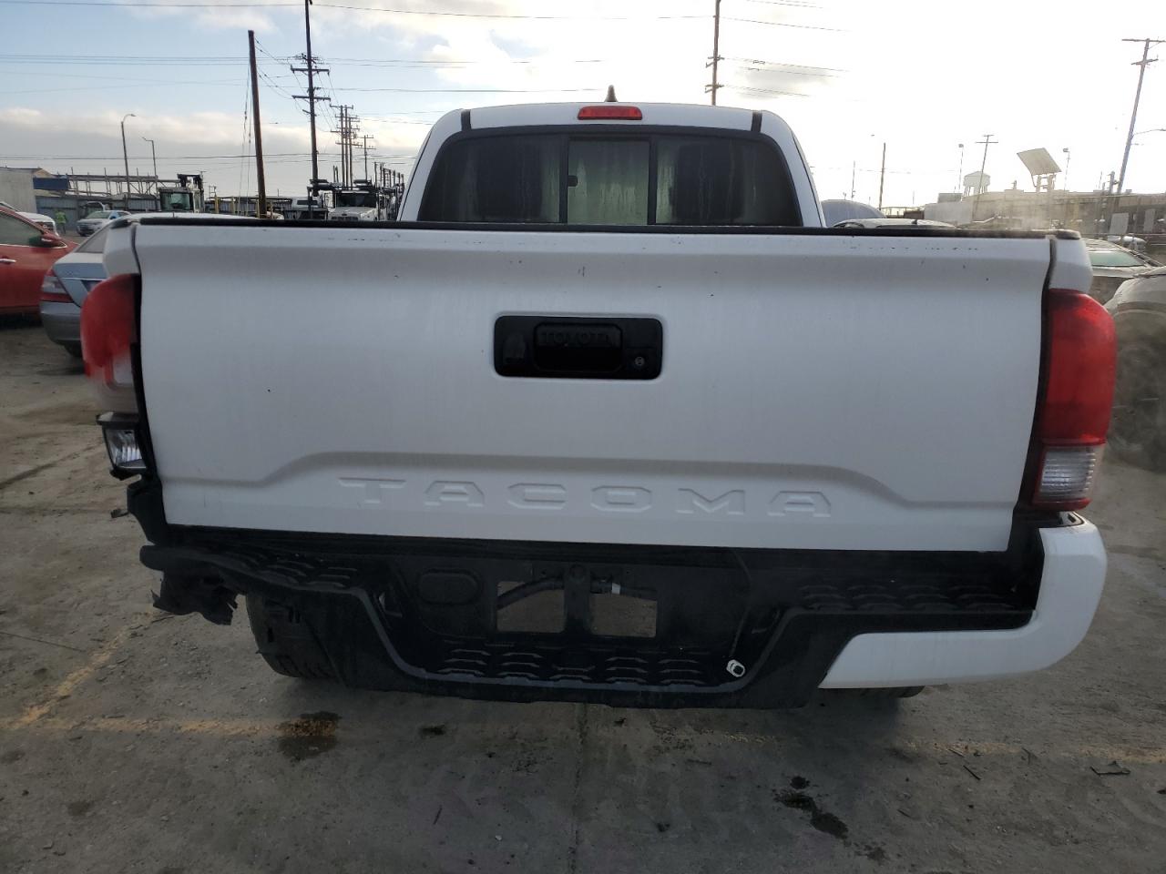 2021 Toyota Tacoma VIN 3TYRX5GNXMT020636 Copart auction photo, side / front end damage thumbnail 6