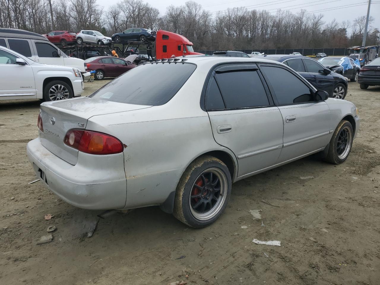 2002 Toyota Corolla VIN 2T1BR12E52C574860 Copart auction photo, front end / side damage thumbnail 3