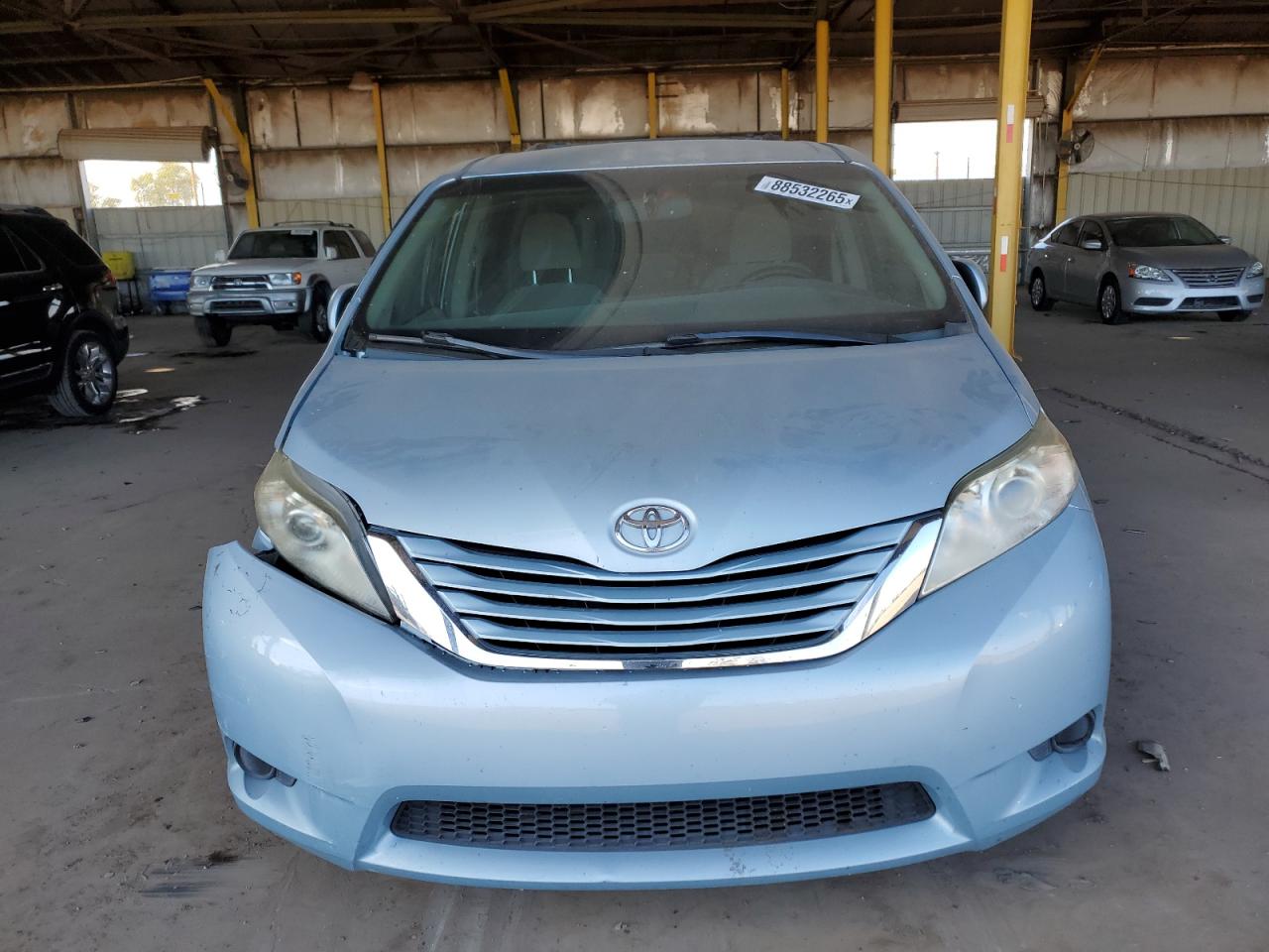 2015 Toyota Sienna VIN 5TDKK3DC8FS598742 Copart auction photo, front end / side damage thumbnail 5