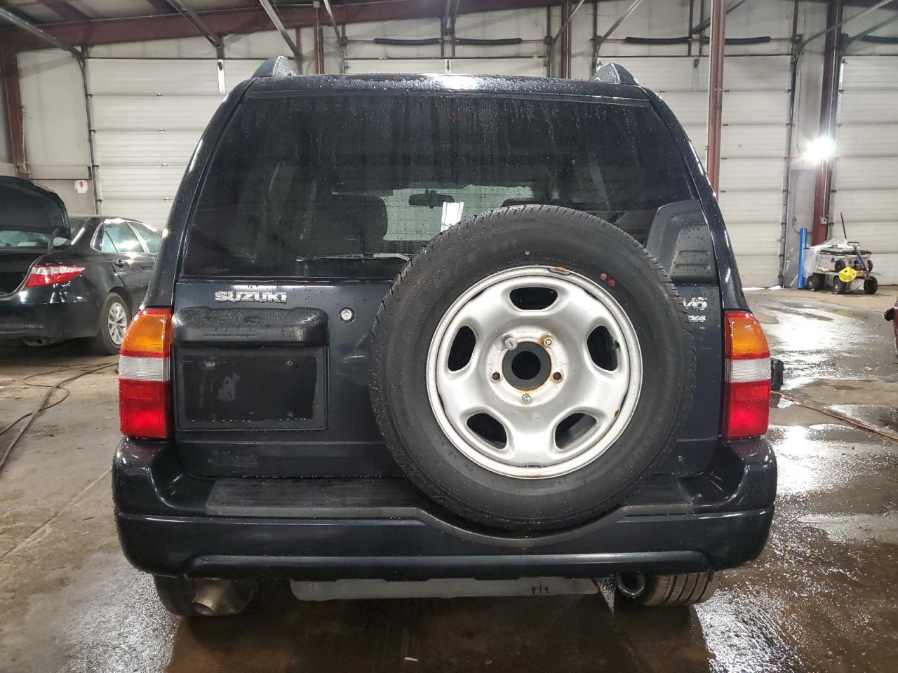 2003 Suzuki Grand Vitara VIN JS3TD62V234100175 Copart auction photo, side / front end damage thumbnail 6