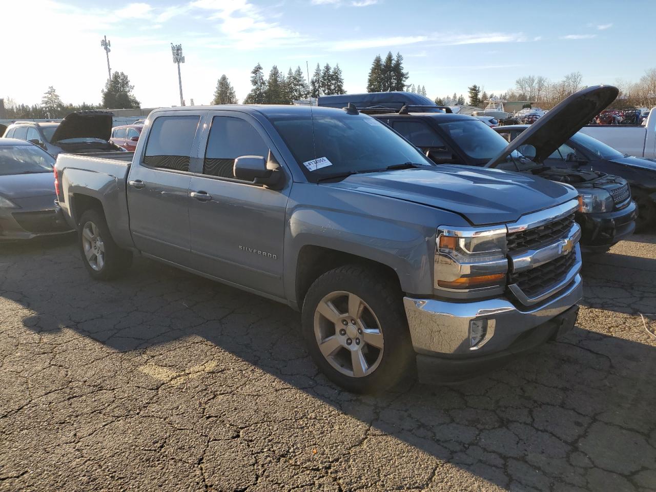 2016 Chevrolet Silverado VIN 3GCPCREH0GG202349 Copart auction photo, side / front end damage thumbnail 4
