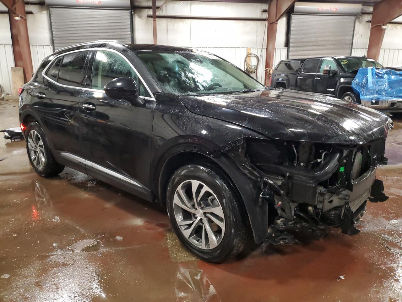 2021 Buick Envision VIN LRBFZNR45MD107979 Copart auction photo, front end / side damage thumbnail 4