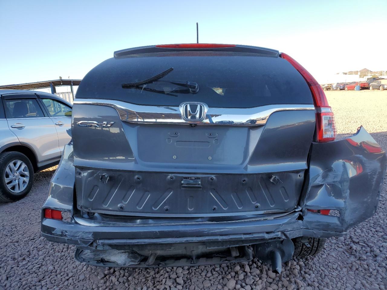 2015 Honda CR-V VIN 3CZRM3H36FG717660 Copart auction photo, all over damage thumbnail 6