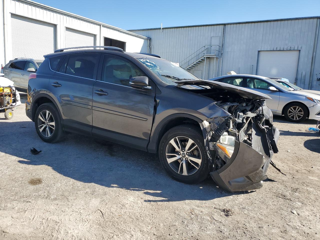 2017 Toyota RAV 4 VIN 2T3WFREV1HW380734 Copart auction photo, front end / rear end damage thumbnail 4