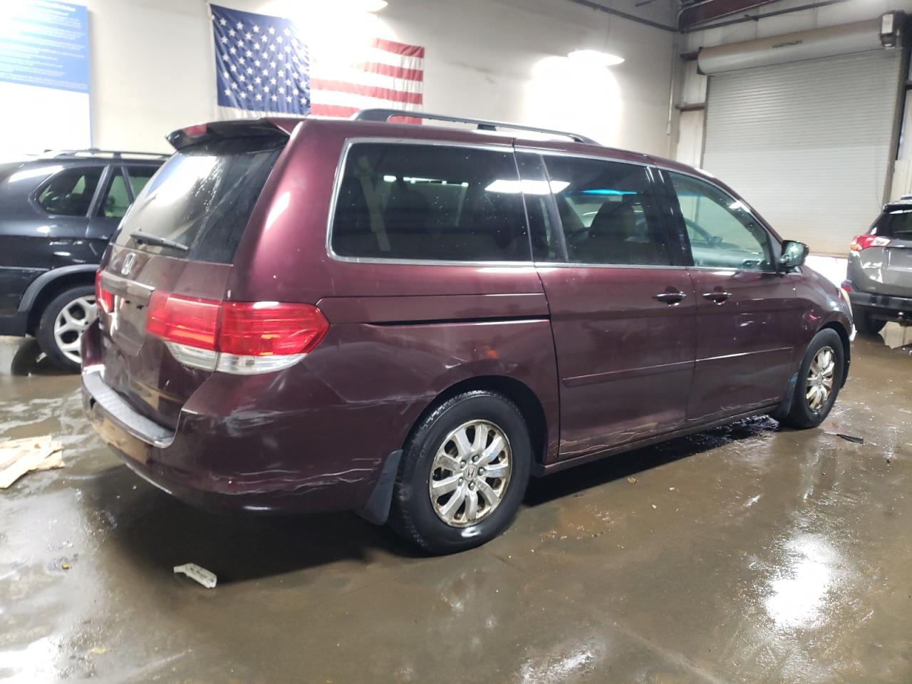 2010 Honda Odyssey VIN 5FNRL3H62AB047431 Copart auction photo, front end / side damage thumbnail 3
