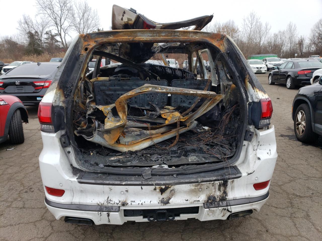 2018 Jeep Grand Cherokee VIN 1C4RJFCG0JC333136 Copart auction photo, burn damage thumbnail 6