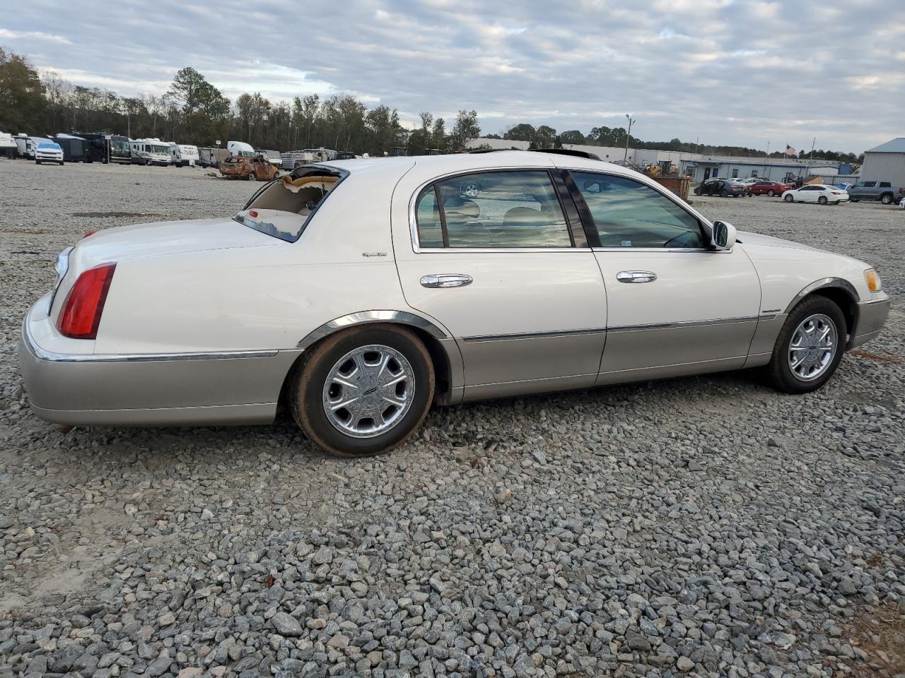 2001 Lincoln Town Car VIN 1LNHM82W71Y703780 Copart auction photo, all over damage thumbnail 3