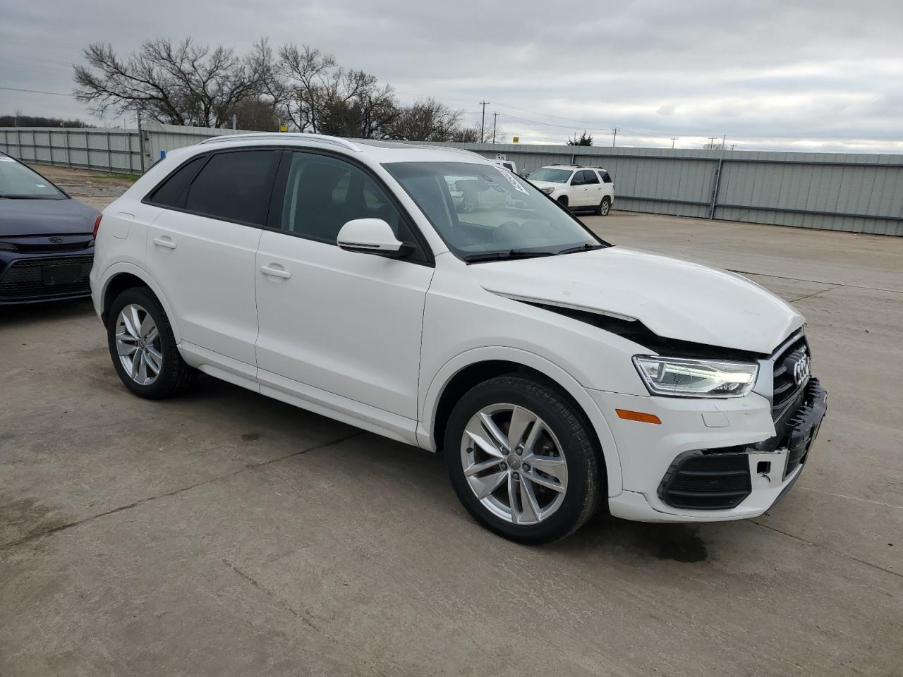 2017 Audi Q3 VIN WA1BCCFS3HR015958 Copart auction photo, front end damage thumbnail 4