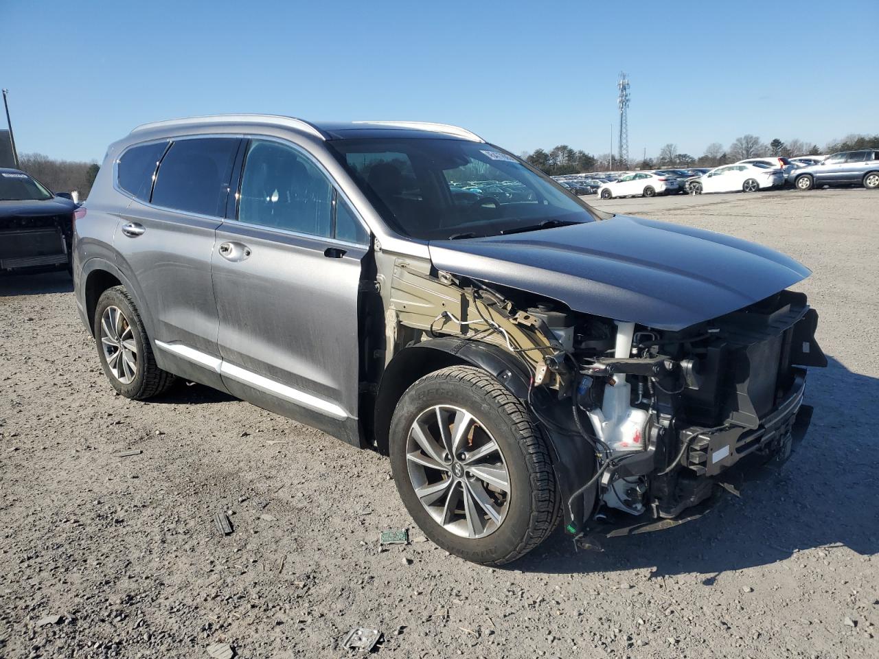 2020 Hyundai Santa Fe VIN 5NMS3CAD9LH163995 Copart auction photo, front end / minor dent/scratches damage thumbnail 4