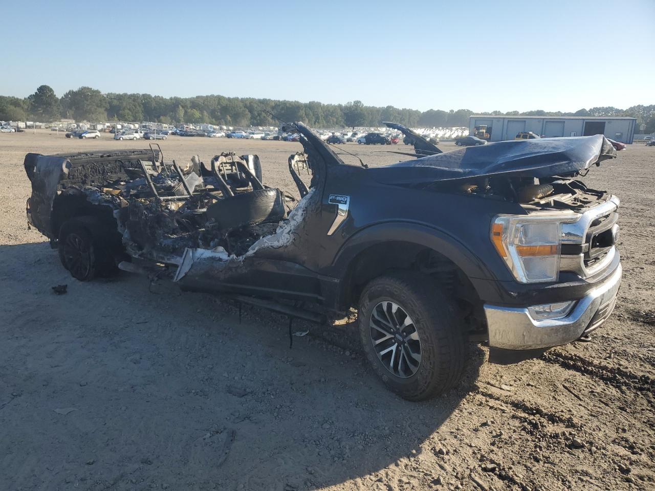2021 Ford F-150 VIN 1FTFW1E55MFA09363 Copart auction photo, burn damage thumbnail 4