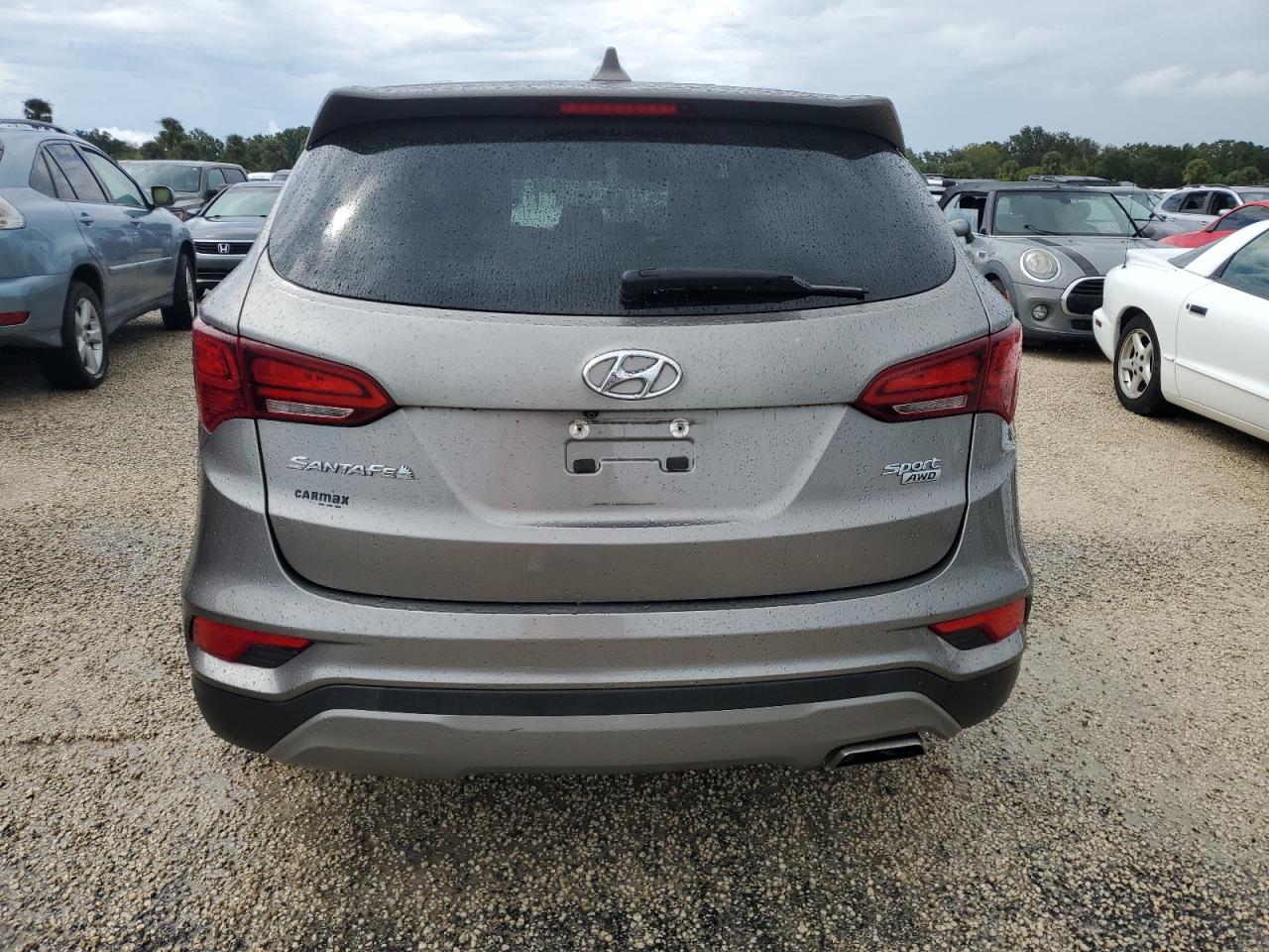 2017 Hyundai Santa Fe VIN 5NMZTDLB2HH027201 Copart auction photo, water/flood damage thumbnail 6
