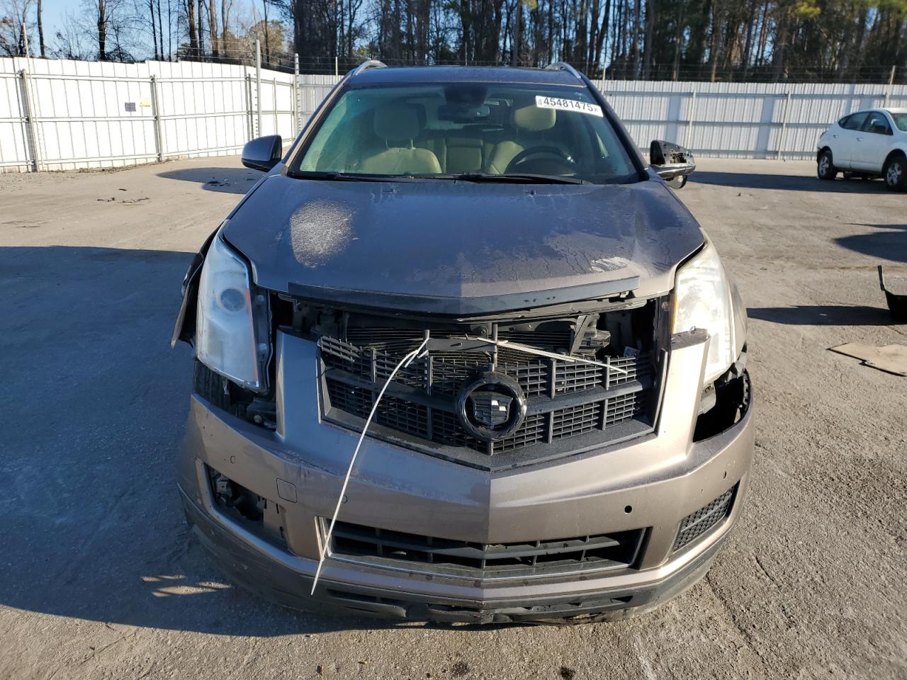 2012 Cadillac SRX VIN 3GYFNAE37CS541302 Copart auction photo, all over damage thumbnail 5