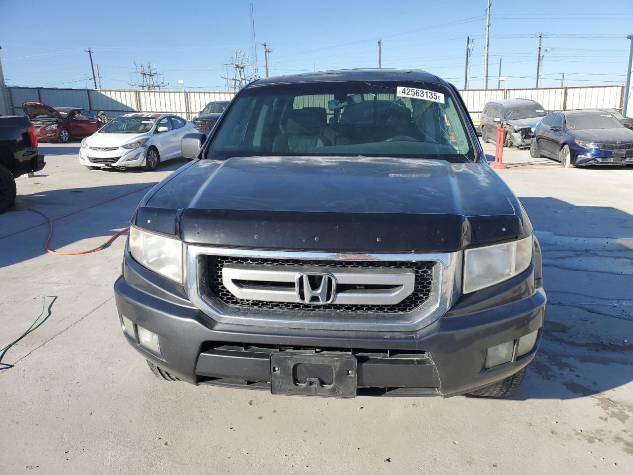 2010 Honda Ridgeline VIN 5FPYK1F51AB002145 Copart auction photo, side damage thumbnail 5
