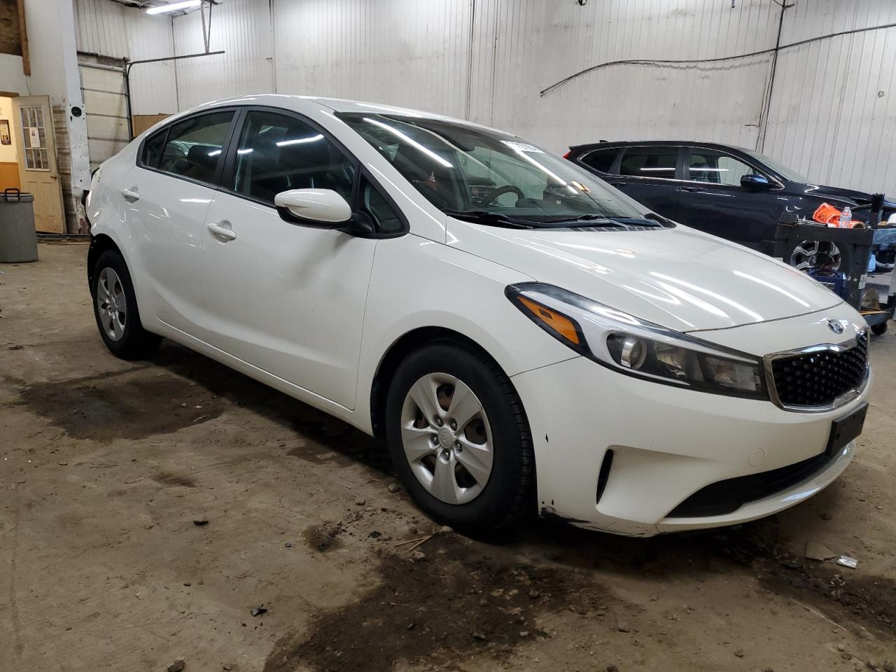 2017 KIA Forte VIN 3KPFK4A74HE054993 Copart auction photo, all over damage thumbnail 4