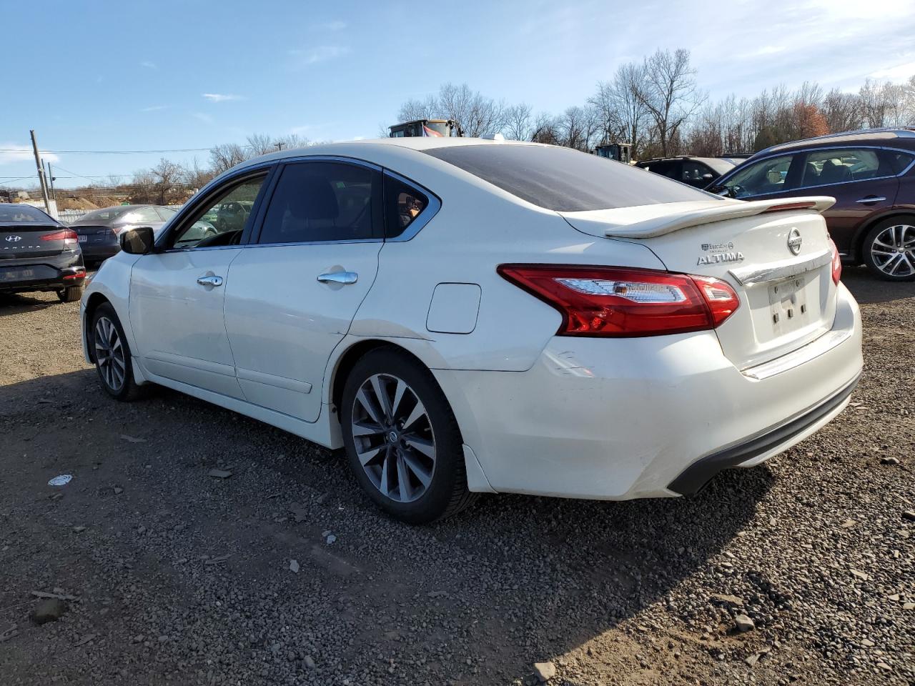 2016 Nissan Altima VIN 1N4AL3AP4GC279797 Copart auction photo, side / rear end damage thumbnail 2