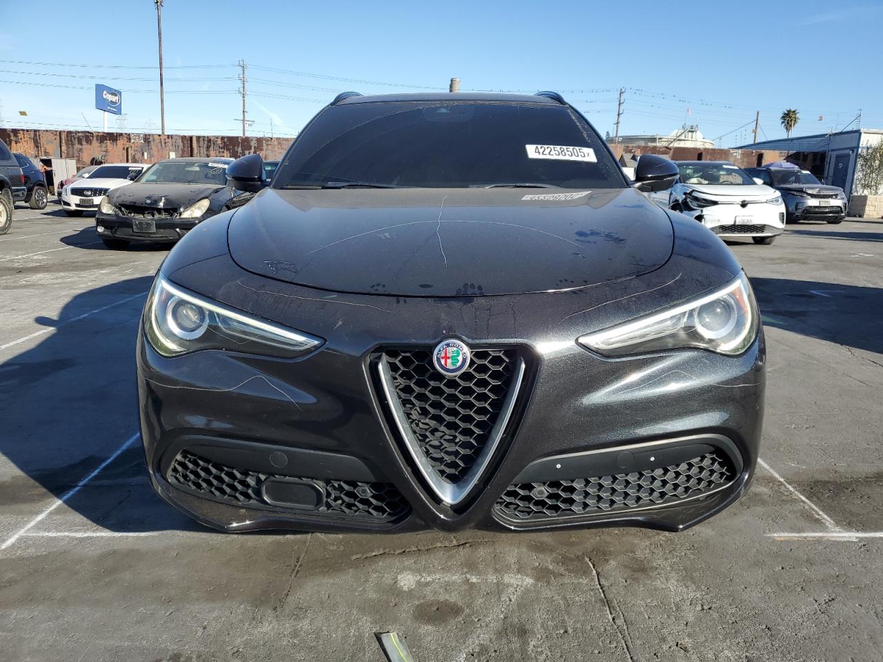 2018 Alfa Romeo Stelvio VIN ZASFAKNN6J7B94170 Copart auction photo, vandalism / minor dent/scratches damage thumbnail 5