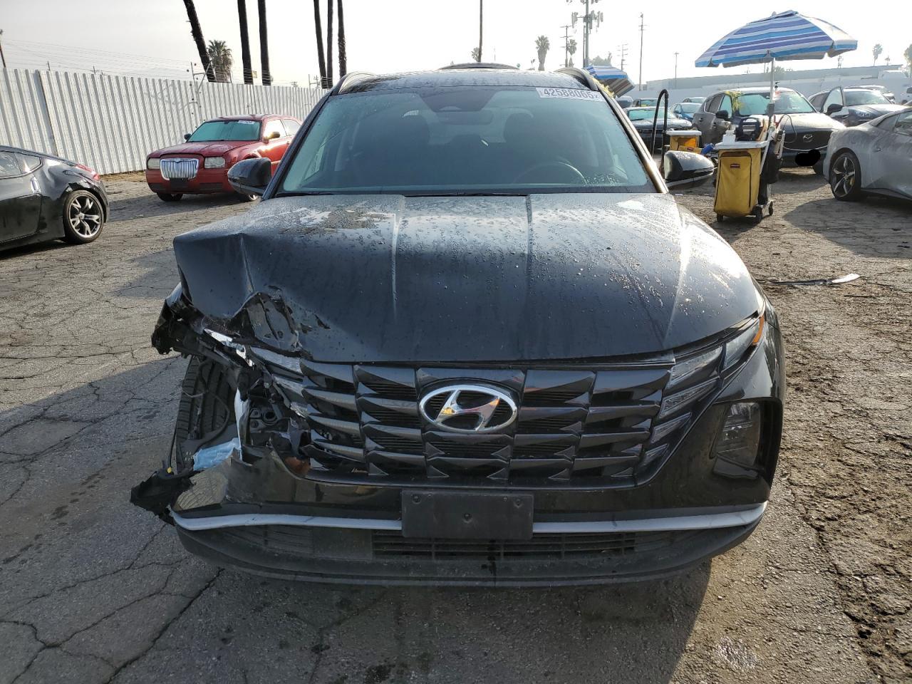 2022 Hyundai Tucson VIN 5NMJFCAE4NH046064 Copart auction photo, front end / minor dent/scratches damage thumbnail 5