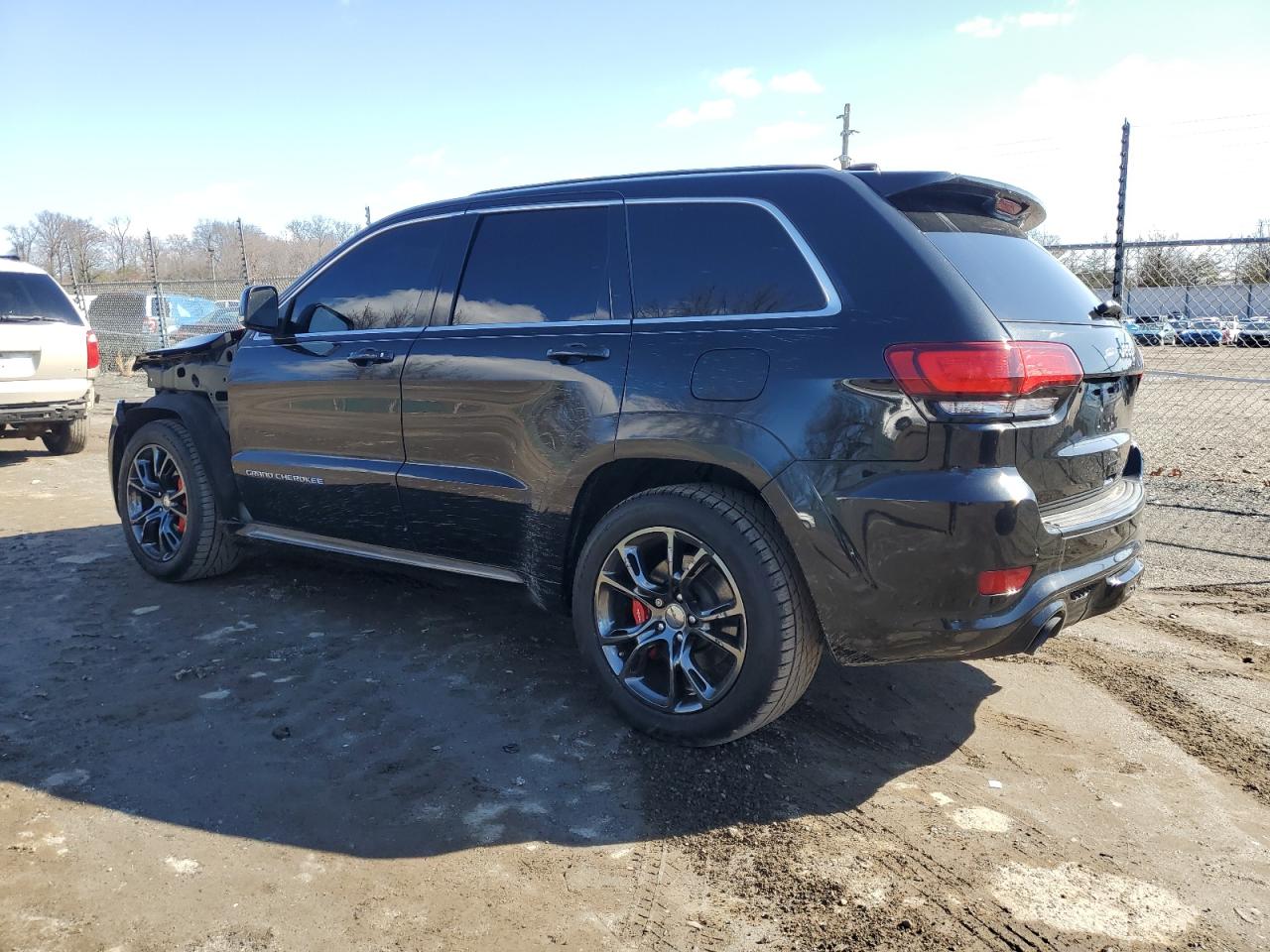 2015 Jeep Grand Cherokee VIN 1C4RJFDJ4FC899222 Copart auction photo, front end / minor dent/scratches damage thumbnail 2