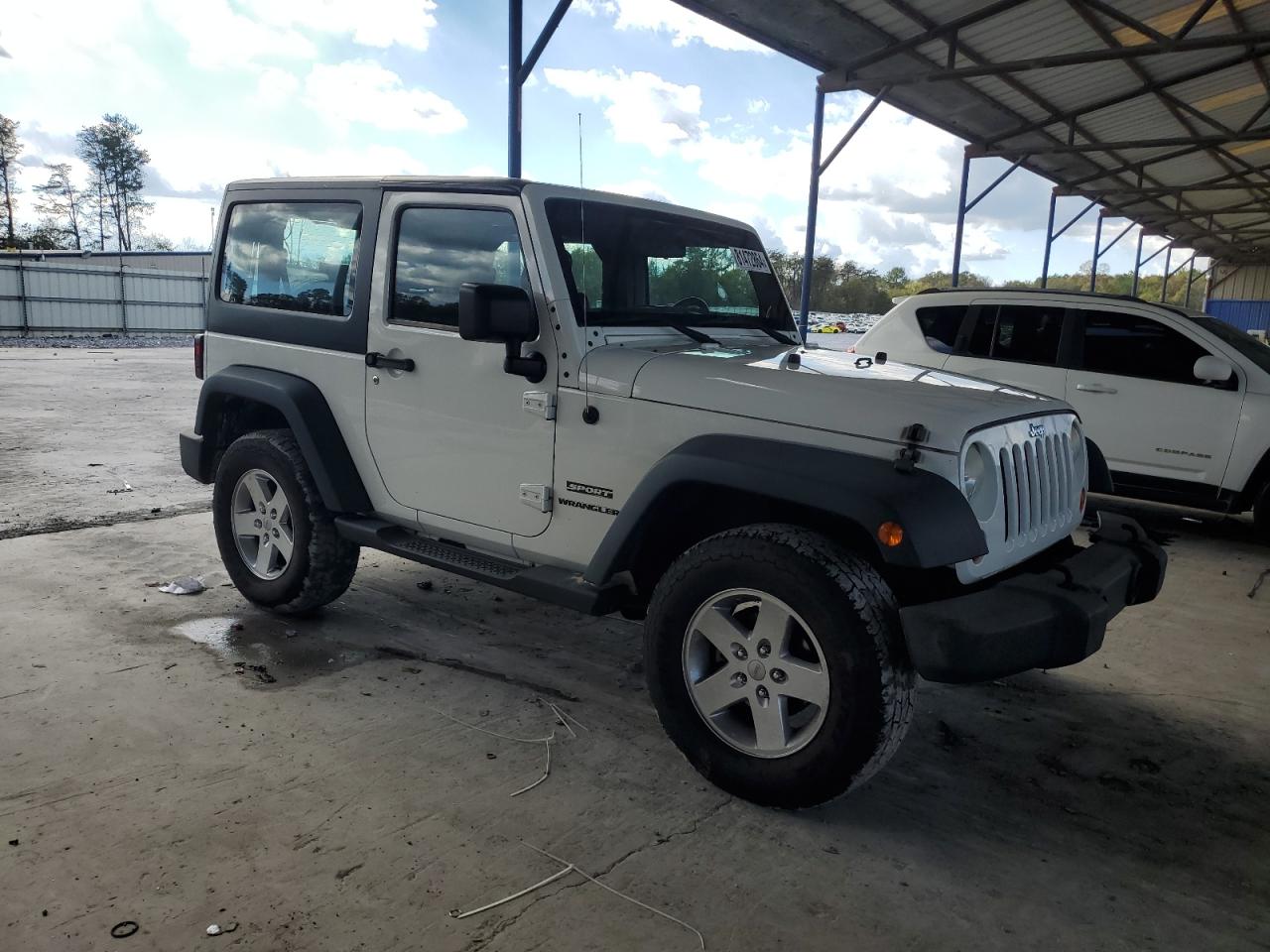 2012 Jeep Wrangler VIN 1C4AJWAG9CL210647 Copart auction photo, side / rear end damage thumbnail 4
