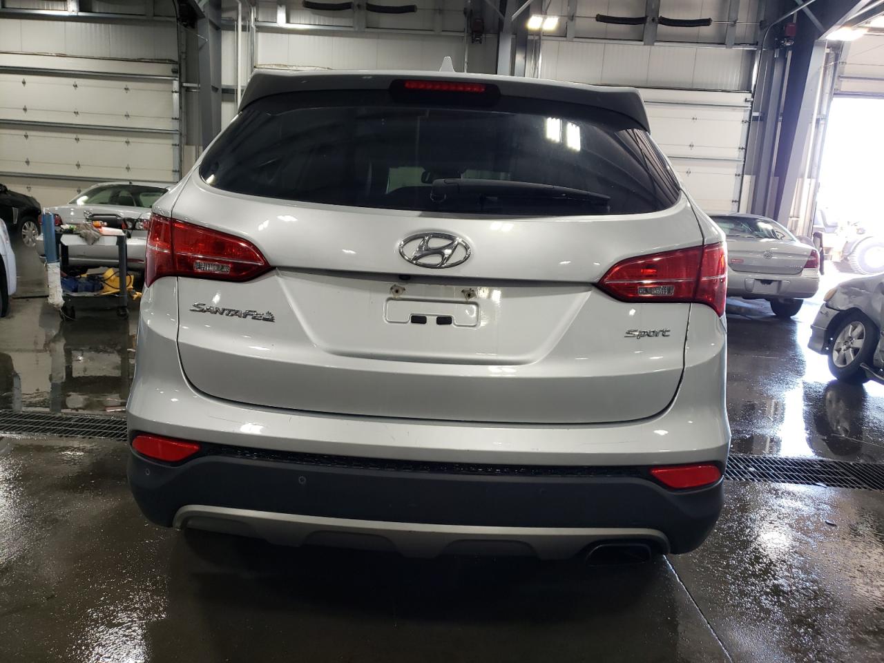 2016 Hyundai Santa Fe VIN 5XYZU3LBXGG367311 Copart auction photo, burn damage thumbnail 6