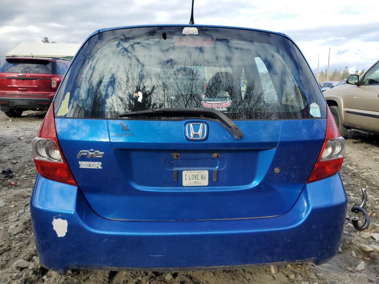2007 Honda Fit VIN JHMGD38477S010873 Copart auction photo, undercarriage / minor dent/scratches damage thumbnail 6