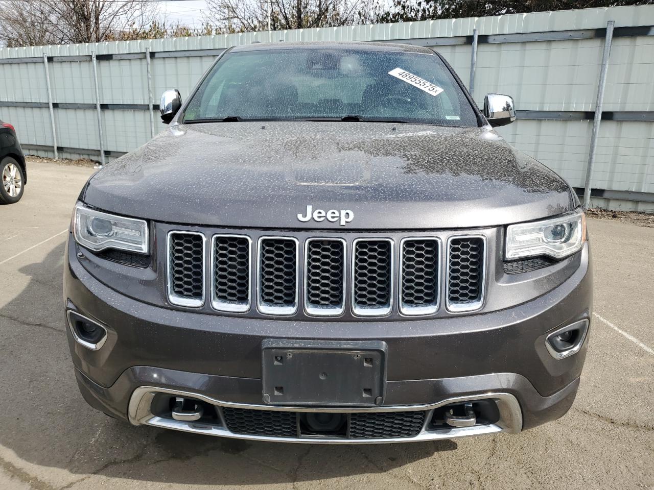 2016 Jeep Grand Cherokee VIN 1C4RJFCG1GC343411 Copart auction photo, side / rear end damage thumbnail 5