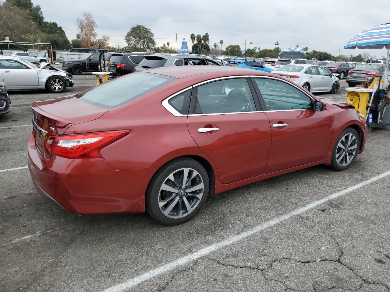 2016 Nissan Altima VIN 1N4AL3AP8GC295131 Copart auction photo, front end / minor dent/scratches damage thumbnail 3