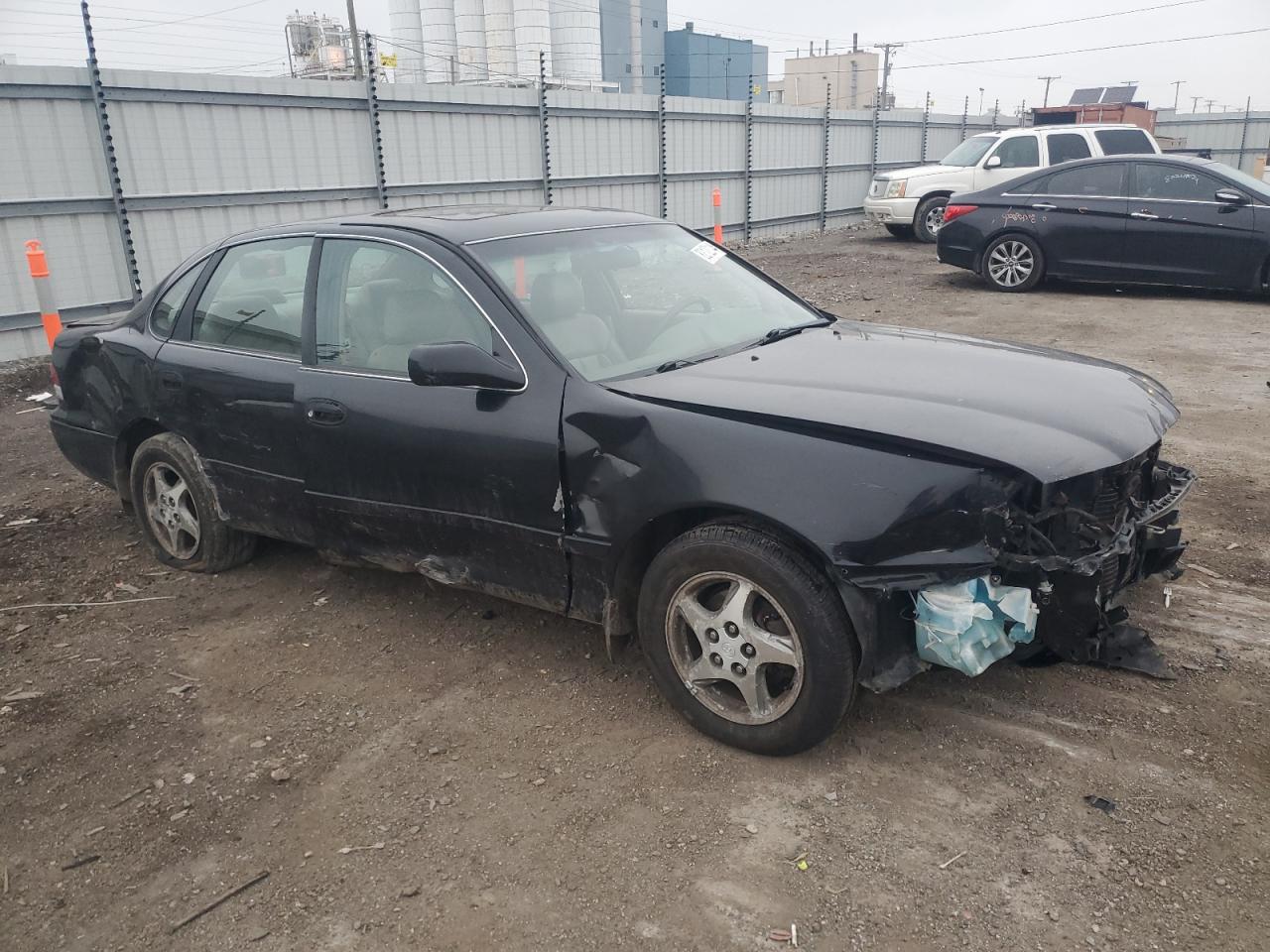1997 Toyota Avalon VIN 4T1BF12B6VU210187 Copart auction photo, all over damage thumbnail 4