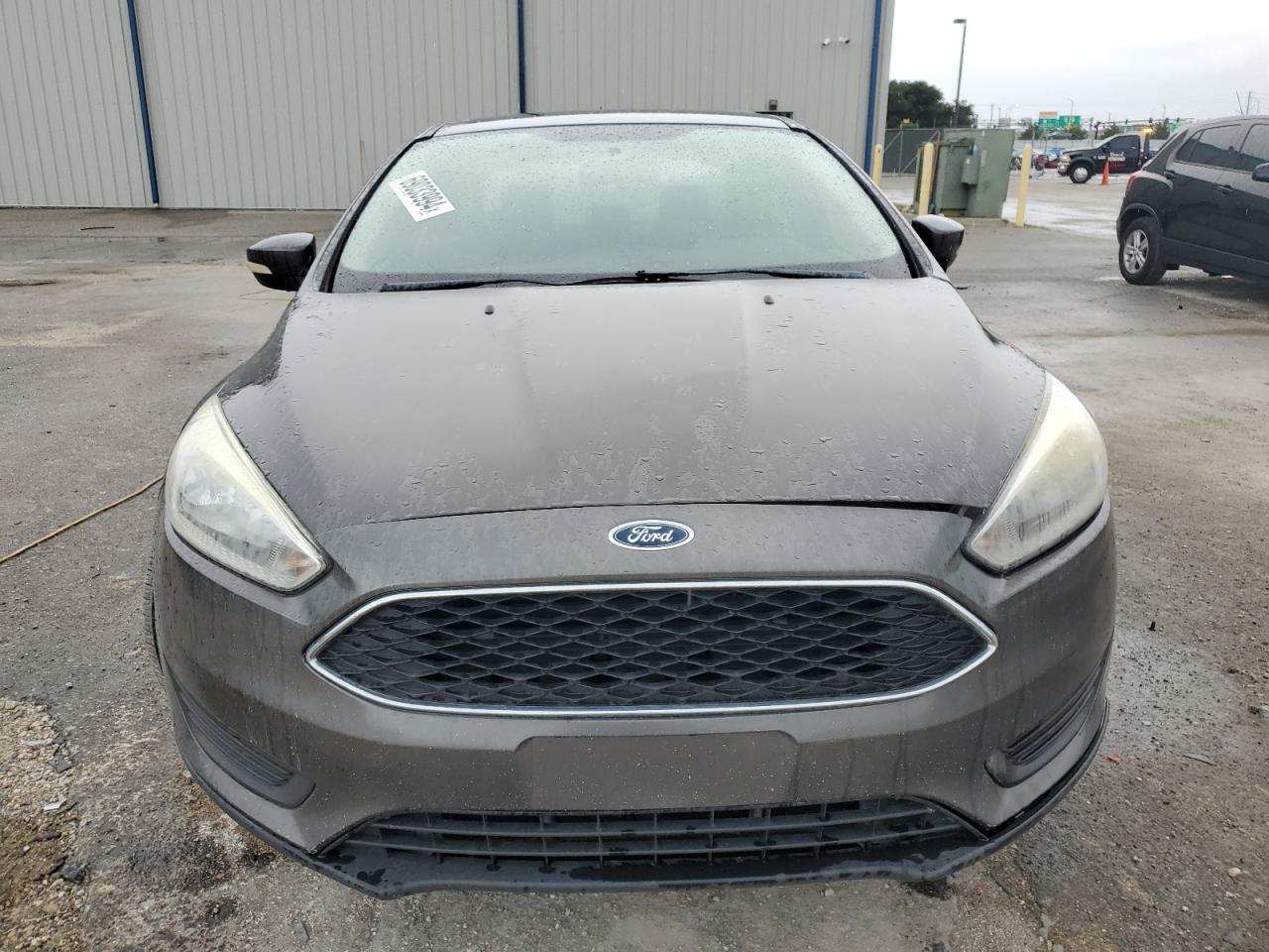2015 Ford Focus VIN 1FADP3F29FL217194 Copart auction photo, rear end / undercarriage damage thumbnail 5