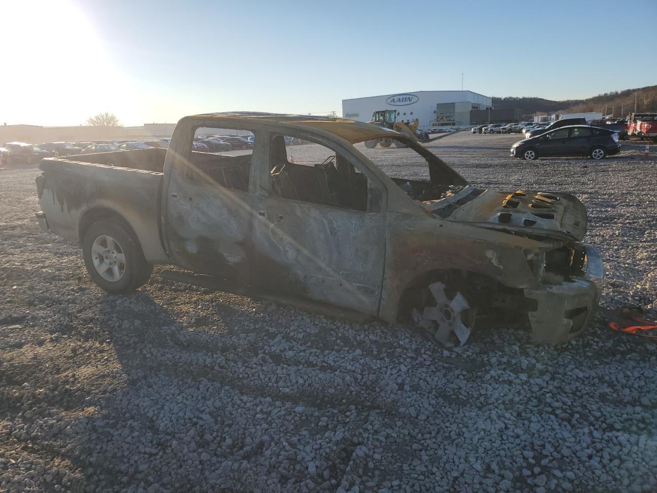 2005 Nissan Titan VIN 1N6BA07A75N570217 Copart auction photo, burn damage thumbnail 4