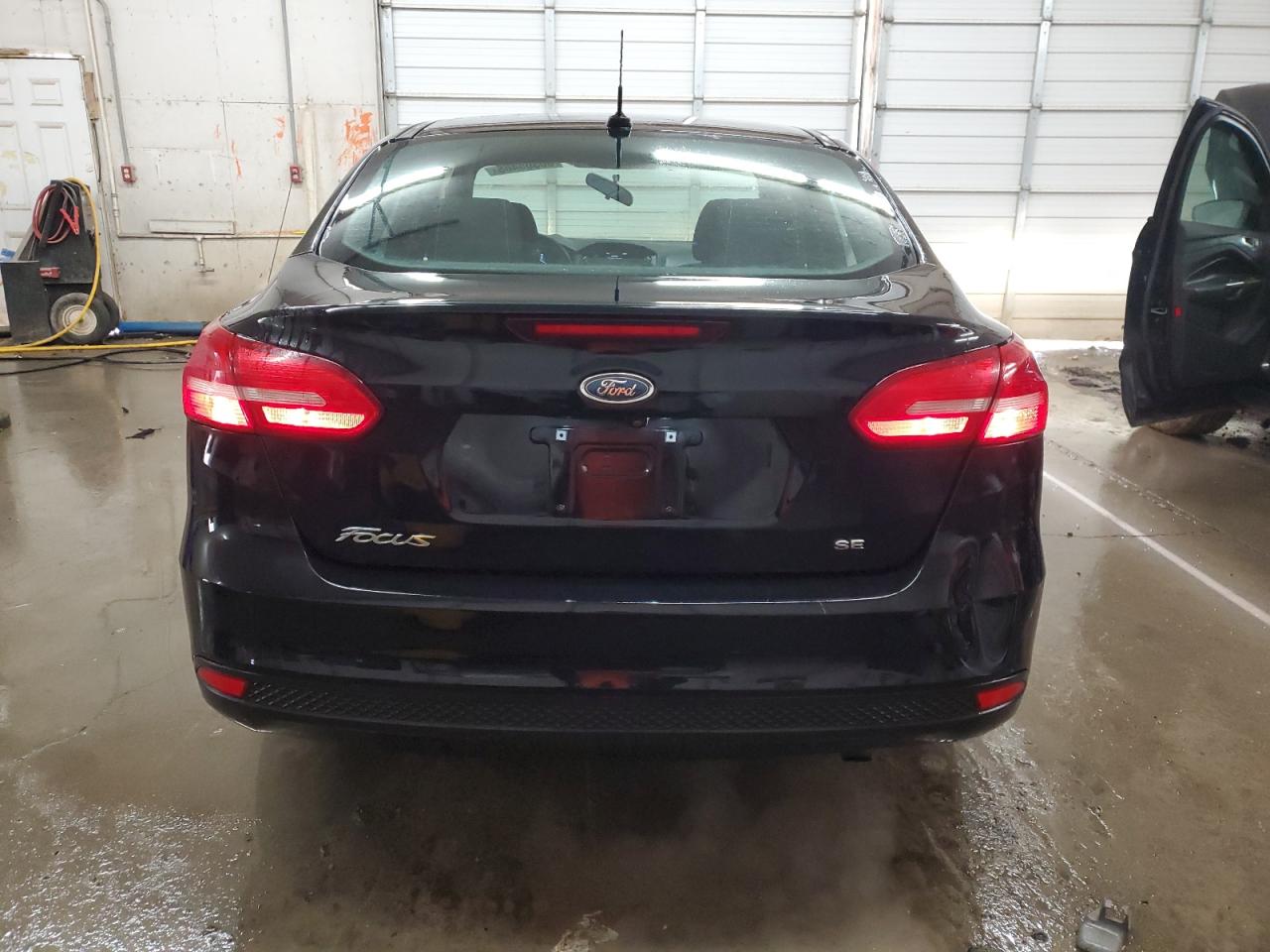 2017 Ford Focus VIN 1FADP3F23HL201687 Copart auction photo, front end / minor dent/scratches damage thumbnail 6