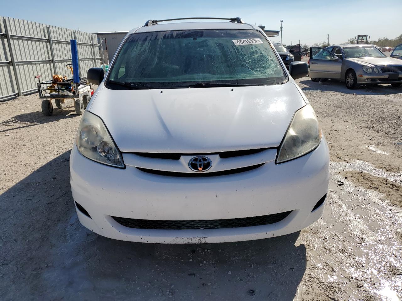 2010 Toyota Sienna VIN 5TDKK4CC5AS330117 Copart auction photo, side damage thumbnail 5