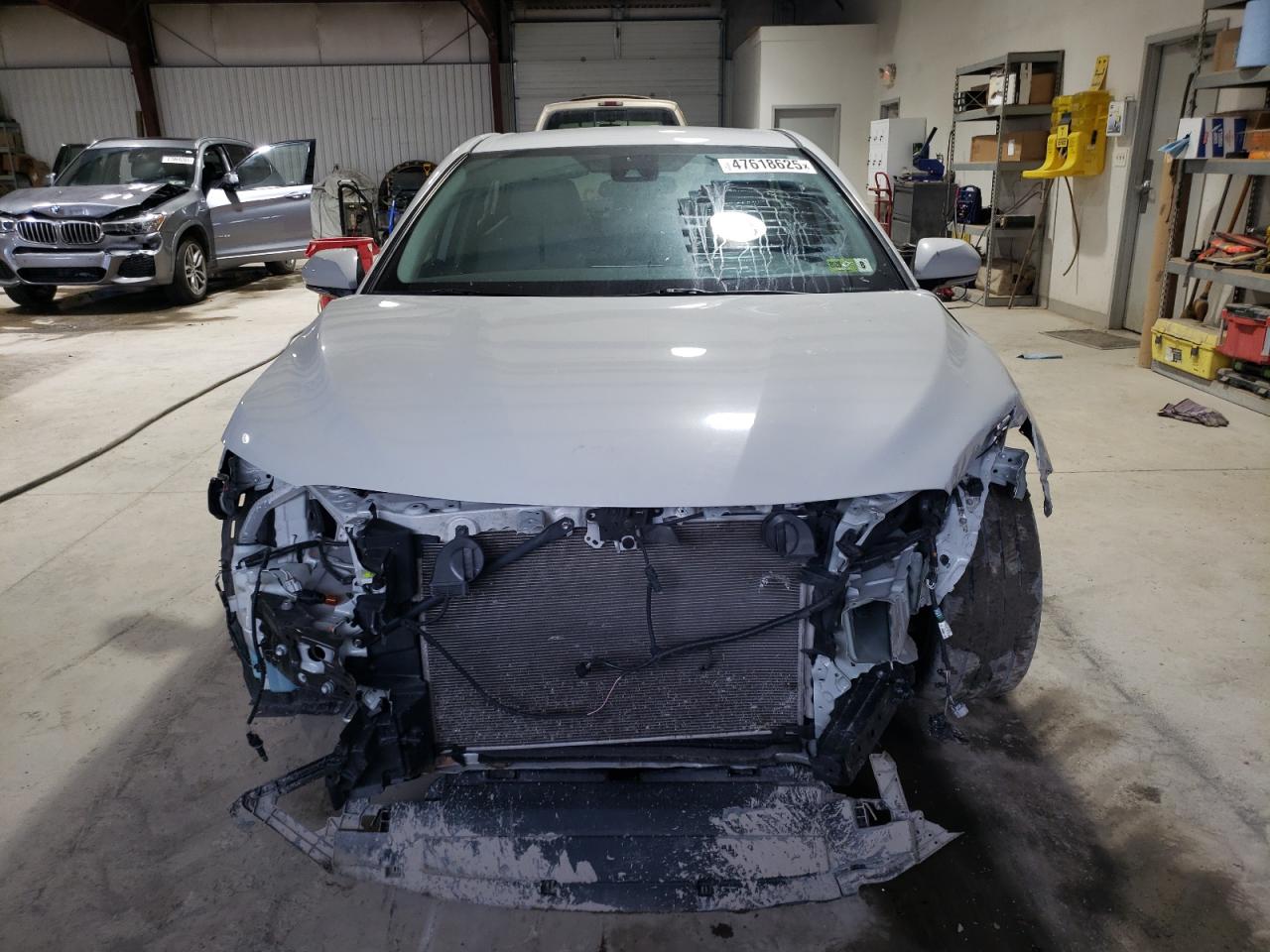 2022 Toyota Camry VIN 4T1G11AK5NU002310 Copart auction photo, front end damage thumbnail 5