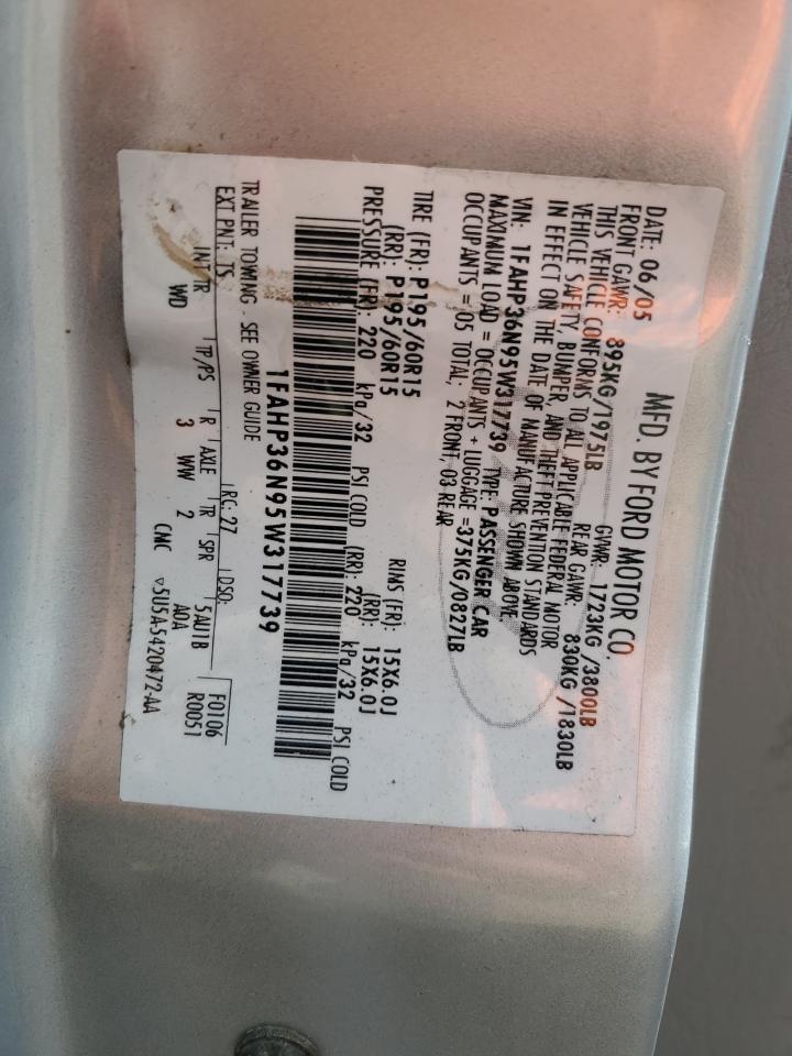 2005 Ford Focus VIN 1FAHP36N95W317739 Copart auction photo, side damage thumbnail 13