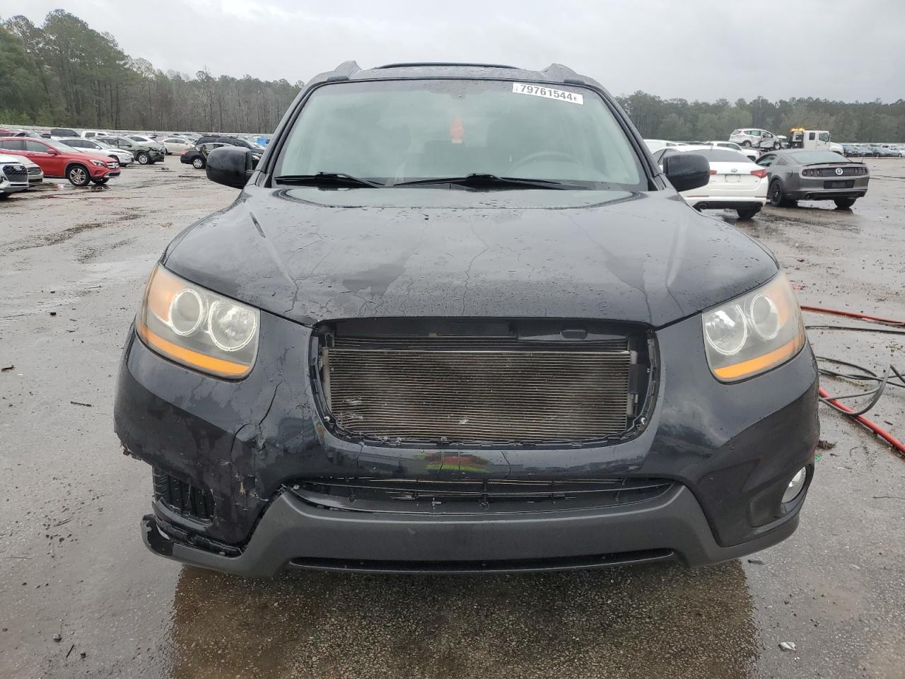 2011 Hyundai Santa Fe VIN 5XYZK4AG8BG075241 Copart auction photo, front end / side damage thumbnail 5