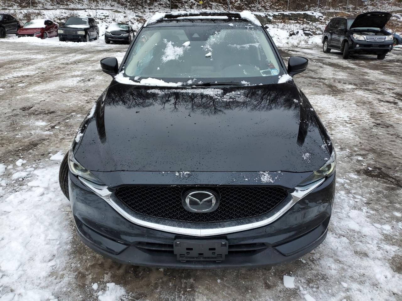 2019 Mazda CX-5 VIN JM3KFBDM9K0643196 Copart auction photo, undercarriage / minor dent/scratches damage thumbnail 5