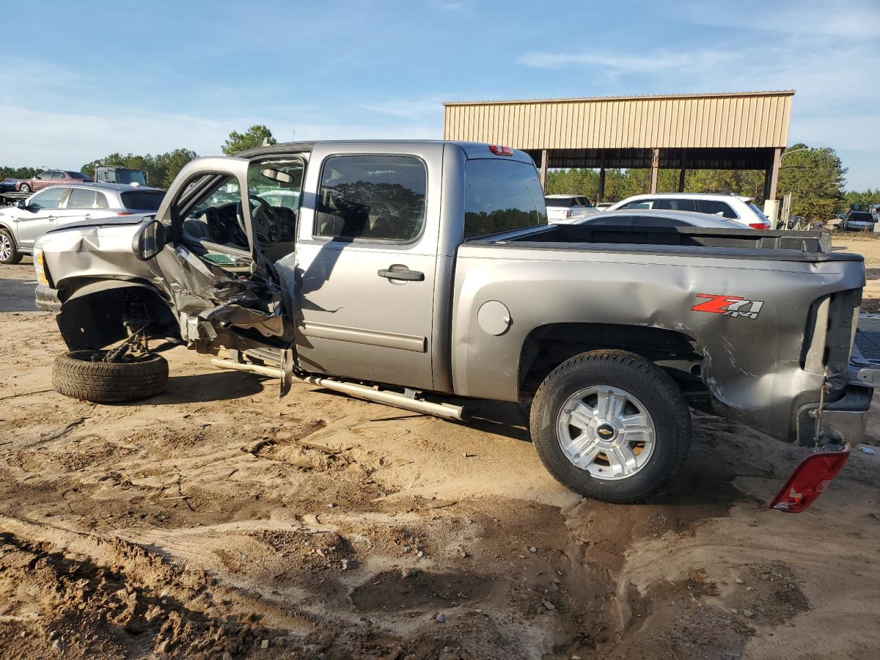 2013 Chevrolet Silverado VIN 3GCPKSE76DG312058 Copart auction photo, side / front end damage thumbnail 2