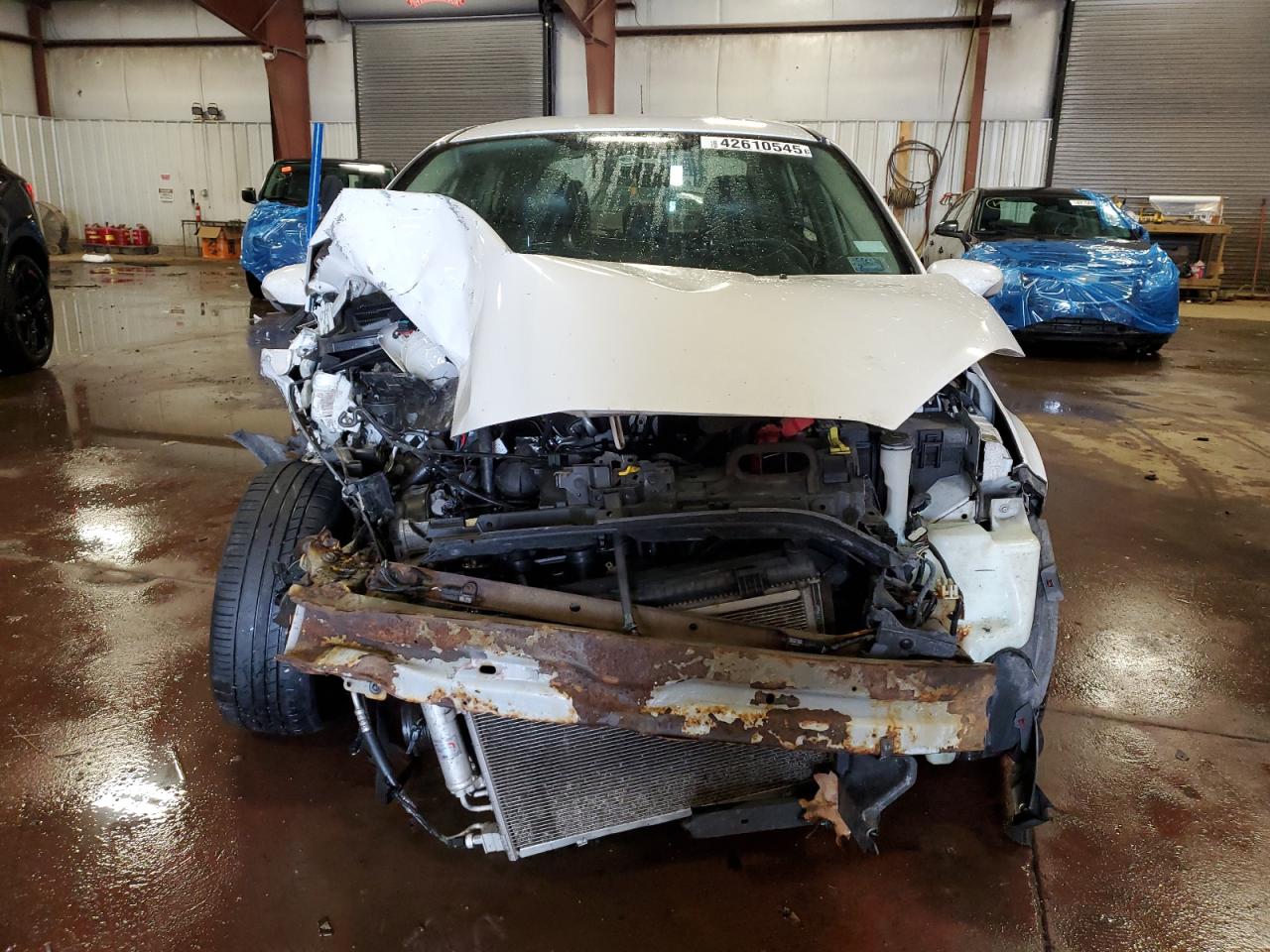 2014 Ford Fiesta VIN 3FADP4CJ6EM220052 Copart auction photo, front end / mechanical damage thumbnail 5