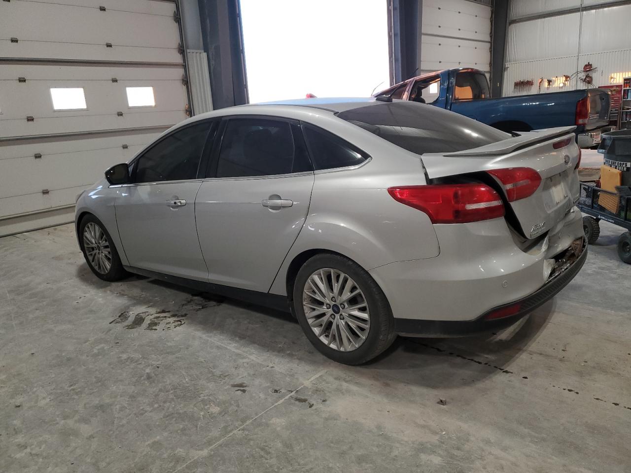 2016 Ford Focus VIN 1FADP3J26GL267690 Copart auction photo, rear end damage thumbnail 2