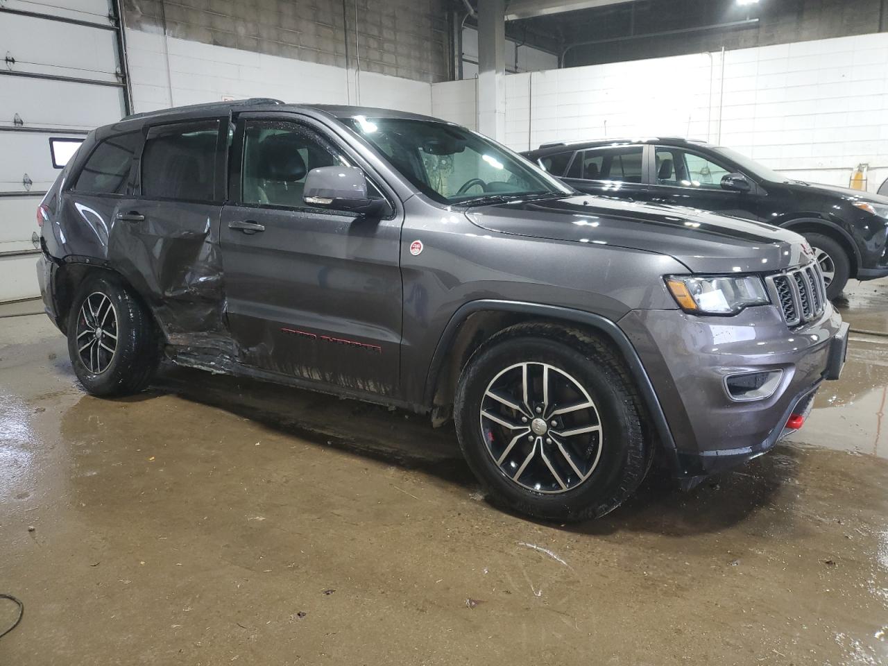 2017 Jeep Grand Cherokee VIN 1C4RJFLT1HC678506 Copart auction photo, side / rear end damage thumbnail 4