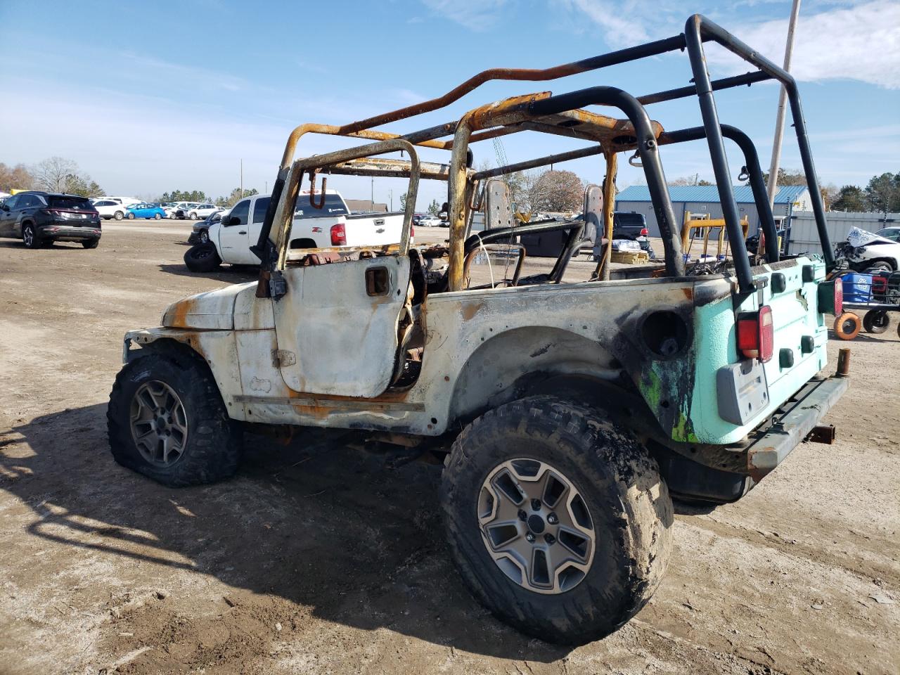 1997 Jeep Wrangler VIN 1J4FY49S2VP526847 Copart auction photo, burn damage thumbnail 2