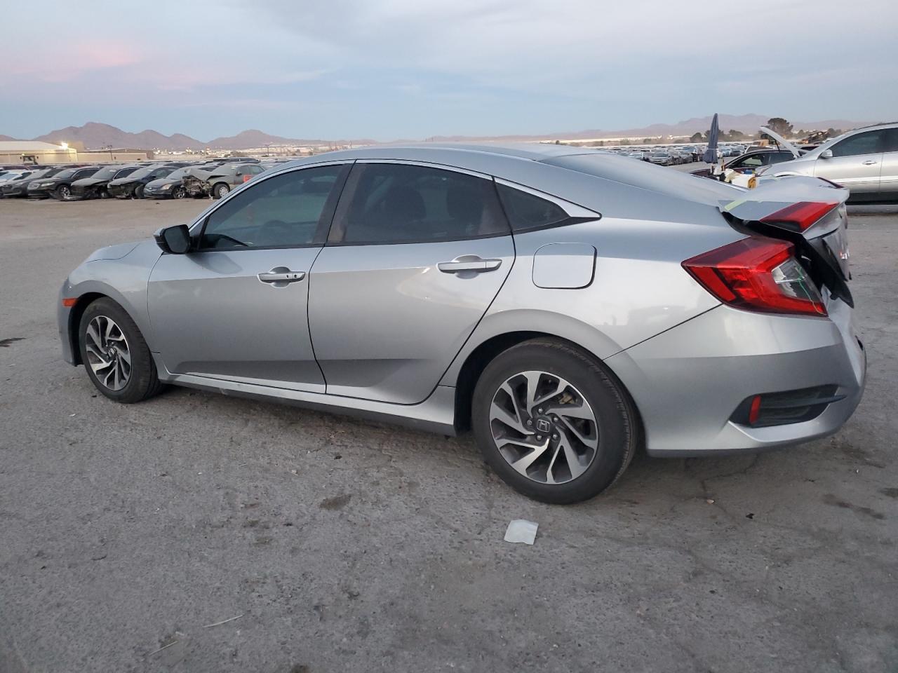 2016 Honda Civic VIN 19XFC2F7XGE039519 Copart auction photo, rear end damage thumbnail 2