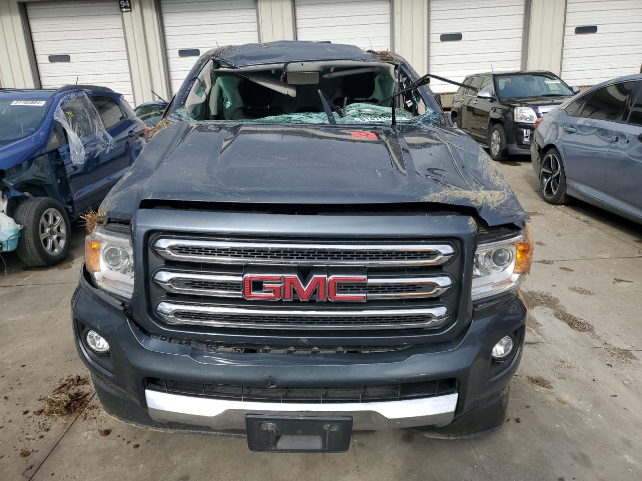 2016 GMC Canyon VIN 1GTG6CE30G1220986 Copart auction photo, rollover damage thumbnail 5