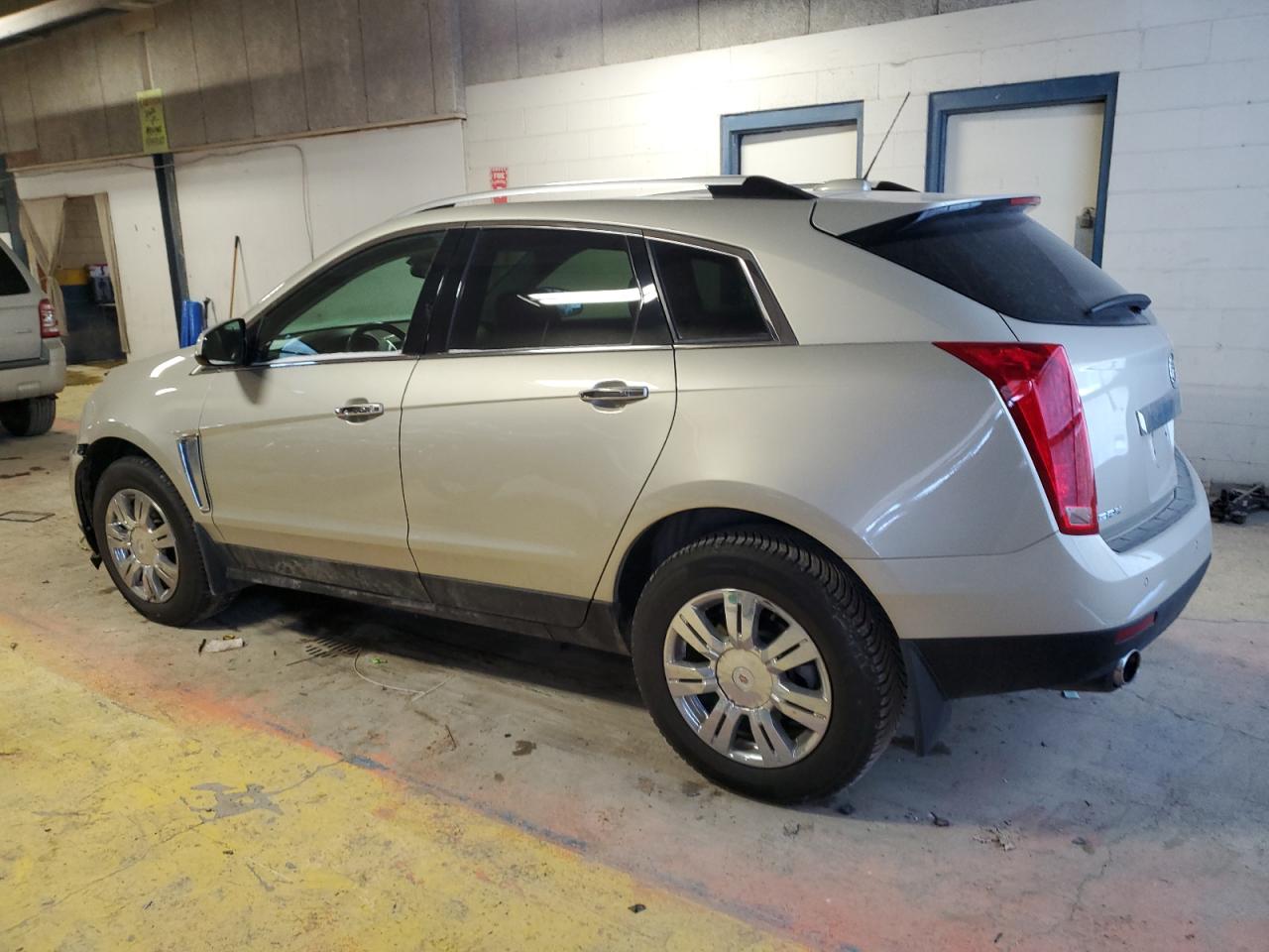2015 Cadillac SRX VIN 3GYFNBE31FS571034 Copart auction photo, front end / minor dent/scratches damage thumbnail 2