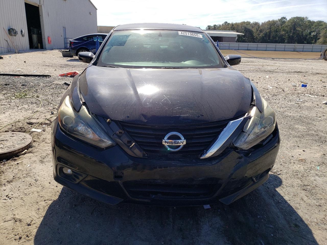 2017 Nissan Altima VIN 1N4AL3AP0HC125511 Copart auction photo, front end / minor dent/scratches damage thumbnail 5