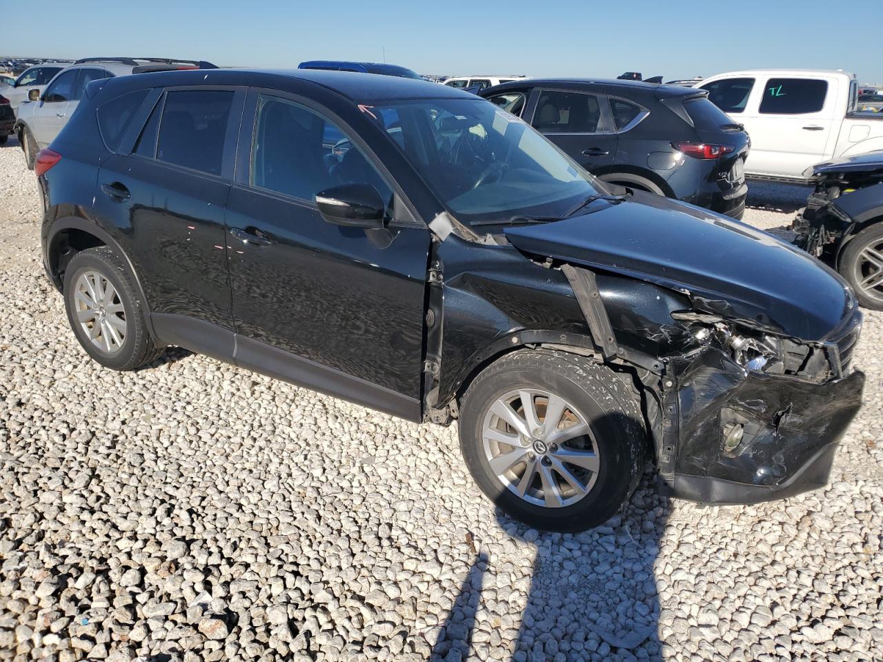 2016 Mazda CX-5 VIN JM3KE2CY1G0635995 Copart auction photo, all over damage thumbnail 4