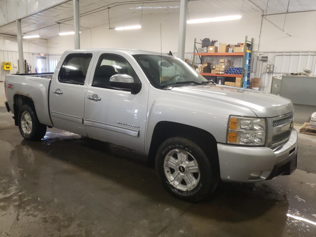 2011 Chevrolet Silverado VIN 1GCPKSE39BF133699 Copart auction photo, rear end / undercarriage damage thumbnail 4