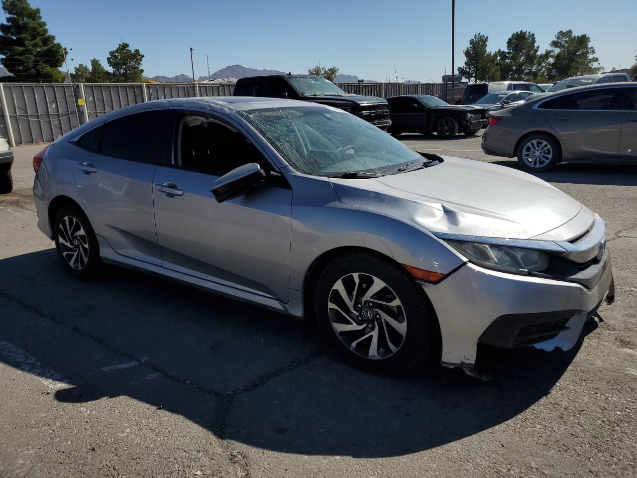 2016 Honda Civic VIN 19XFC2F74GE067221 Copart auction photo, rollover damage thumbnail 4