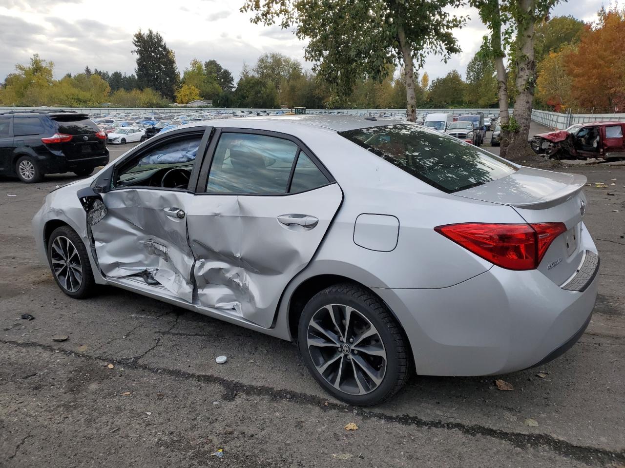 2017 Toyota Corolla VIN 5YFBURHEXHP652871 Copart auction photo, side damage thumbnail 2